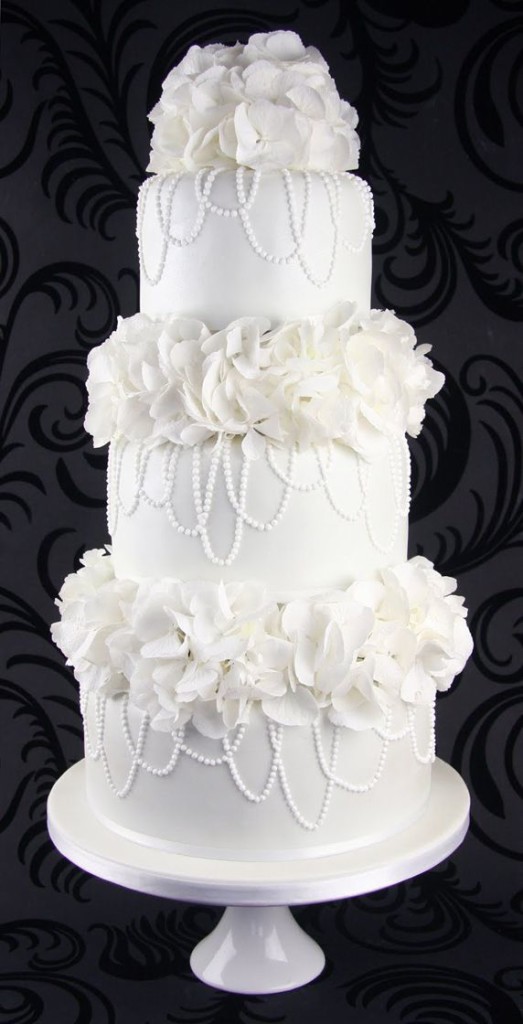 Pretty Draping Pearls and Flowers Wedding Cake