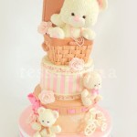 Three bears, a basket and a bicycle cake