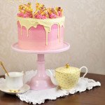 White Chocolate Drizzle and Pink Frosting Swirls Cake