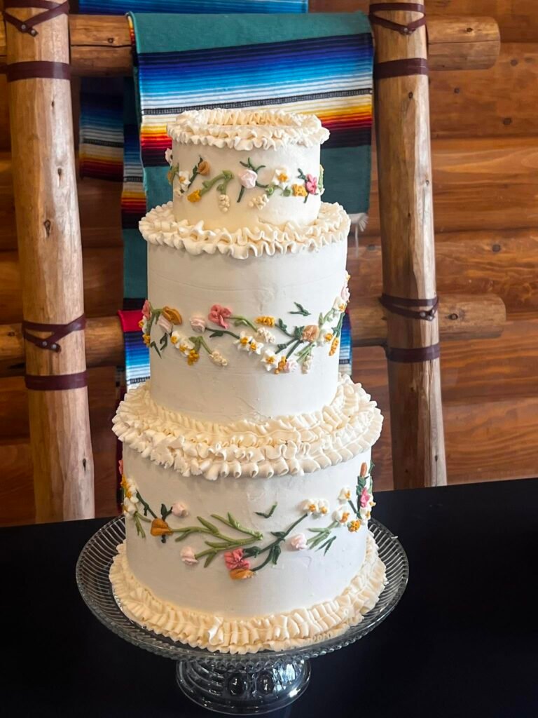 Cake by Something Sweet Bakery and Treats